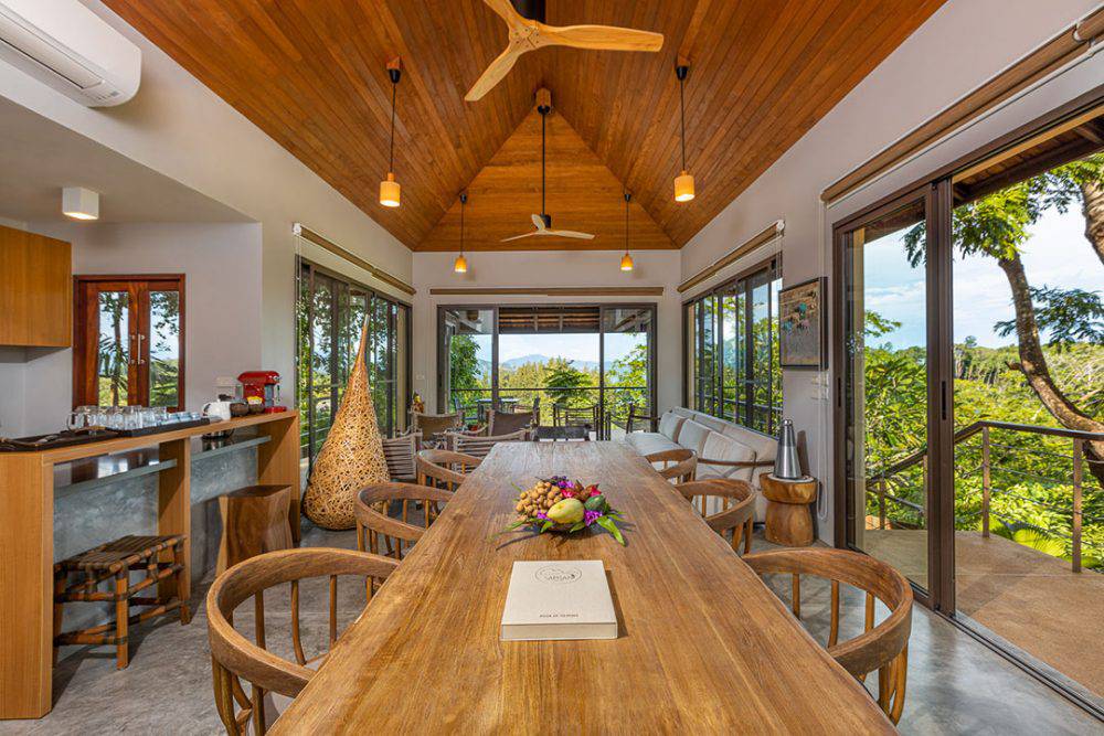 living room and kitchen with sea side view